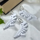 Hvit Flexi Dino Nøkkelring thumbnail