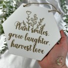 Plant Smiles, Grow Laughter, Harvest Love - Hexagon Skilt thumbnail